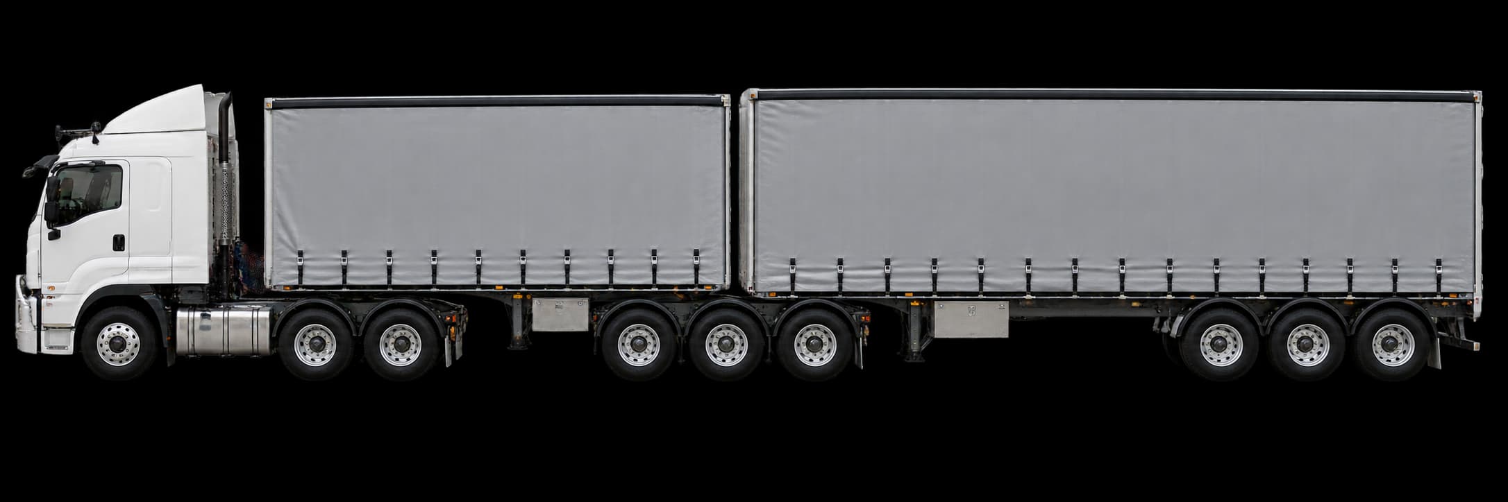 Prime mover and two semitrailers in a B-double arrangement