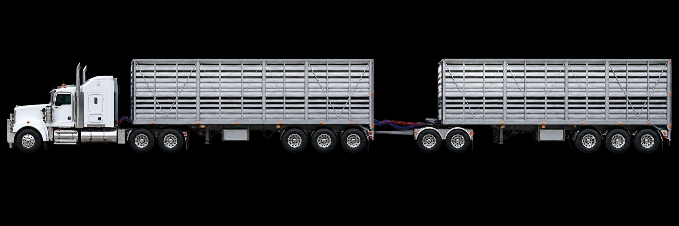 Example road train with two livestock trailers and a converter dolly